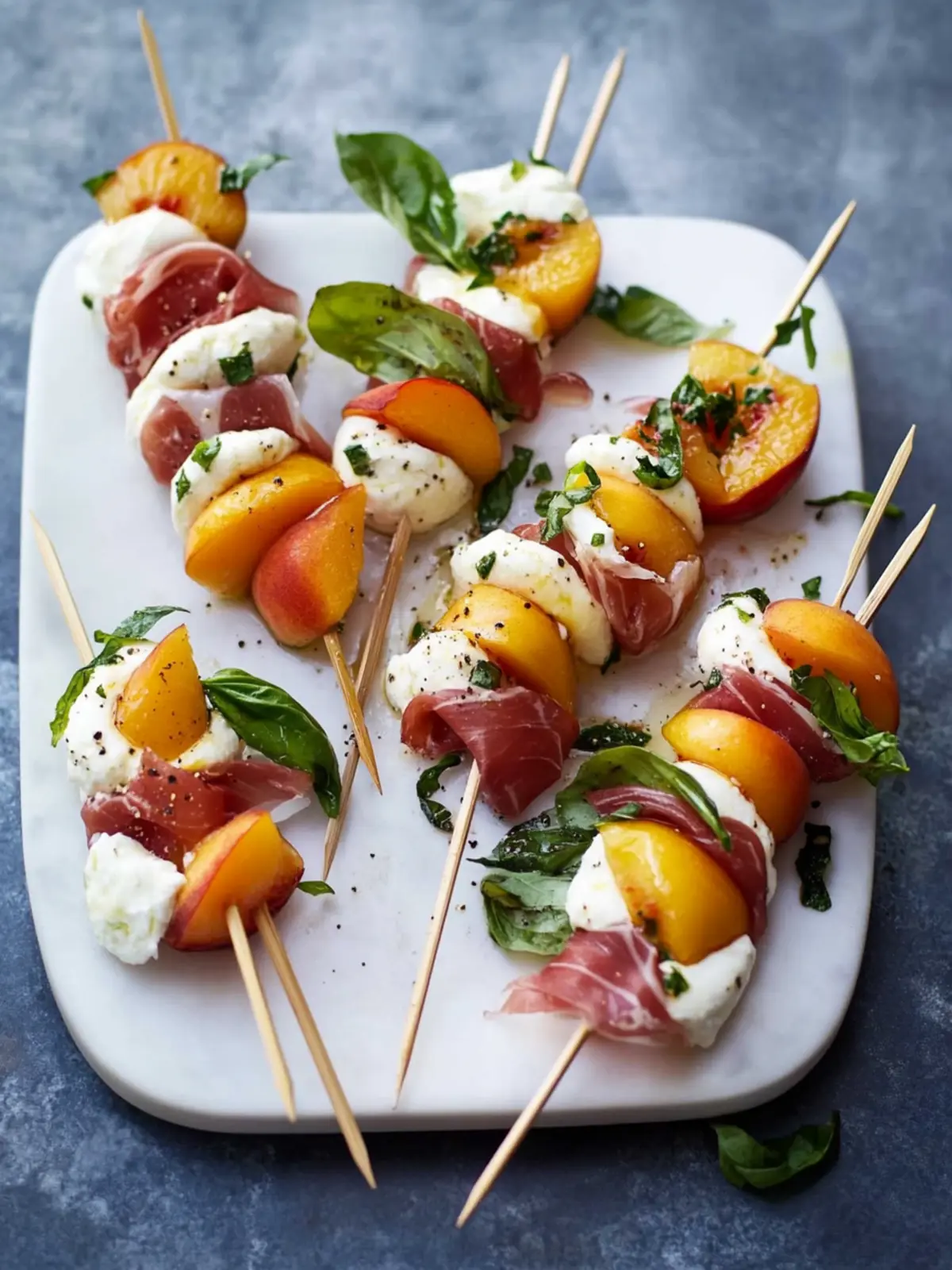 Savory Mozzarella, Prosciutto, and Pickled Peach Skewers 4 Mozzarella, Prosciutto, and Pickled Peach Appetizer Skewers