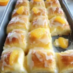 Irresistible Orange Rolls with Warm Sour Cream Butter Glaze 2 Orange Rolls with a Warm Sour Cream Butter Glaze